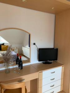 A television and/or entertainment centre at Lilium Villa Hévíz
