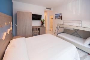Posteľ alebo postele v izbe v ubytovaní Hotel Marconi Express