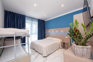 Posteľ alebo postele v izbe v ubytovaní Hotel Marconi Express