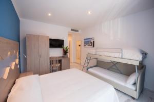 Posteľ alebo postele v izbe v ubytovaní Hotel Marconi Express