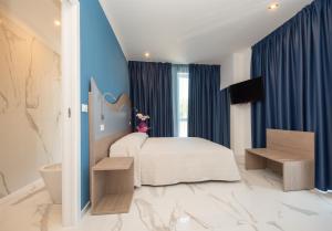 Posteľ alebo postele v izbe v ubytovaní Hotel Marconi Express