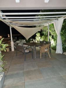 Patio lub wspólna przestrzeń na świeżym powietrzu w obiekcie Casa Perla Holidays