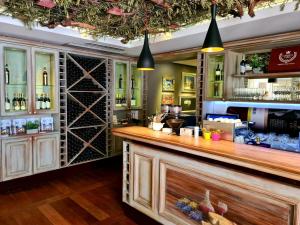 a bar at a restaurant with wine racks at Wine Hotel Cesarica in Međugorje