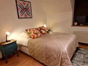 Rúm í herbergi á Restauberge Peitry