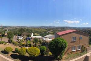 an aerial view of a house with bushes and trees at Newlands East, Durban Home, Panoramic•Peaceful• in Duffʼs Road