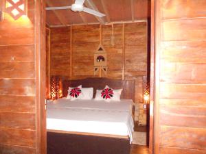 Letto o letti in una camera di 360 Rainforest