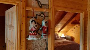 Un pat sau paturi într-o cameră la Lodge House Tara