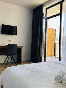 Voodi või voodid majutusasutuse Citro Villa toas