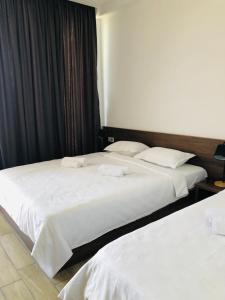 Voodi või voodid majutusasutuse Citro Villa toas