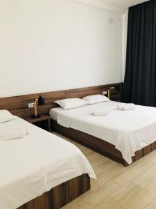 Voodi või voodid majutusasutuse Citro Villa toas