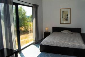 Rúm í herbergi á Private Villa with pool and magnificent view