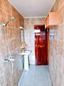 A bathroom at Stone House - Makepe, Douala