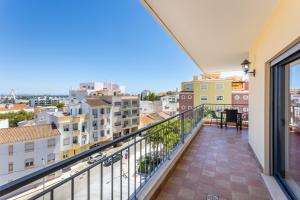 a balcony with a view of the city at Casa Contente in Lagos