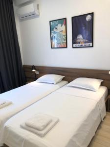 Voodi või voodid majutusasutuse Citro Villa toas