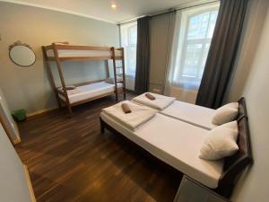 Postel nebo postele na pokoji v ubytování ApartHotel Riga