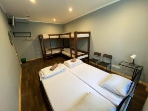 Postel nebo postele na pokoji v ubytování ApartHotel Riga