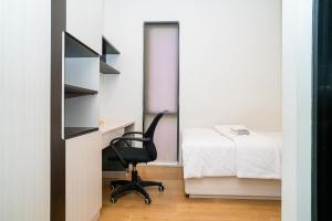 Voodi või voodid majutusasutuse Three J Residence 2 toas