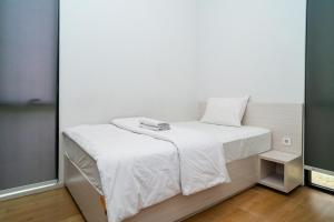 Voodi või voodid majutusasutuse Three J Residence 2 toas