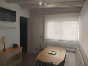 TV/Unterhaltungsangebot in der Unterkunft Blue Beach House ATICO CON TERRAZA