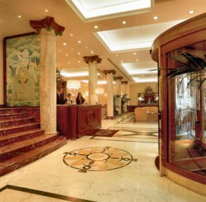 The lobby or reception area at Andreola Central Hotel