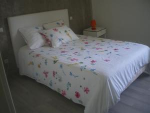 Llit o llits en una habitació de Maison de campagne MONTCUQ en Quercy Blanc