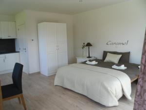 Voodi või voodid majutusasutuse B&B Caramel toas