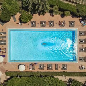 an overhead view of a large swimming pool at Aequa Hotel in Vico Equense