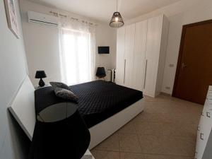 Postel nebo postele na pokoji v ubytování Deep Sea Residence