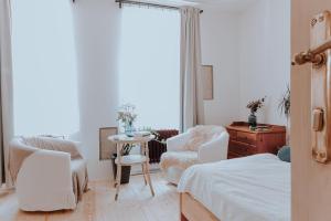 Postel nebo postele na pokoji v ubytování Apartmány Tiskárna
