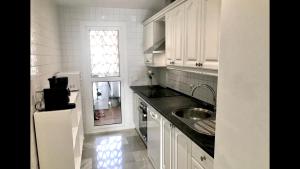 A kitchen or kitchenette at MI CAPRICHO 2F BEACHFRONT- Apartment with sea view - Costa del Sol