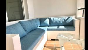 A seating area at MI CAPRICHO 2F BEACHFRONT- Apartment with sea view - Costa del Sol