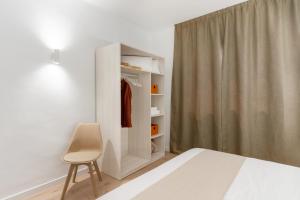 Ein Bett oder Betten in einem Zimmer der Unterkunft Apartamentos Venecia