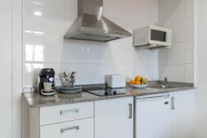 Küche/Küchenzeile in der Unterkunft Apartamentos Venecia