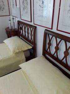 A bed or beds in a room at Locanda Bellavista