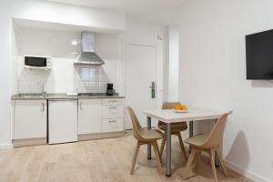 Küche/Küchenzeile in der Unterkunft Apartamentos Venecia