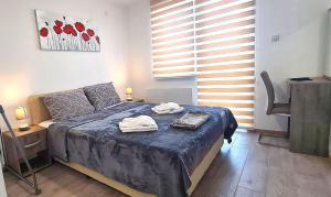 Krevet ili kreveti u jedinici u okviru objekta Apartmani Lavanda