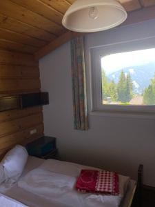 Postel nebo postele na pokoji v ubytování Appartement Latschen - Ferienhaus