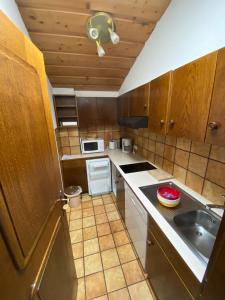 Kuchyň nebo kuchyňský kout v ubytování Appartement Latschen - Ferienhaus