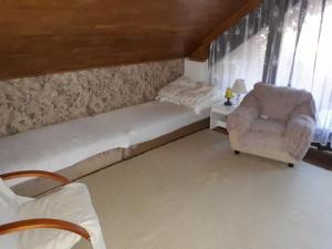 En eller flere senger på et rom på Somlyay’s Summer House