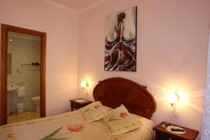 Posteľ alebo postele v izbe v ubytovaní Hostal Populetus