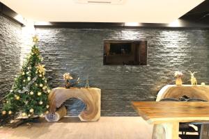 TV a/nebo společenská místnost v ubytování HTel Resort