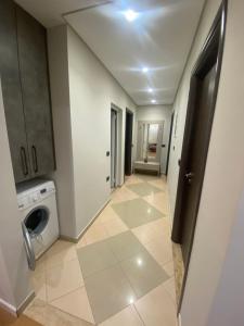a laundry room with a washer and dryer at Villa Panorama - 3 Bedrooms Sea View - Free Parking in Sarandë