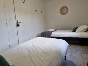 Un ou plusieurs lits dans un hébergement de l'établissement Osemae Immobilier - Redon Port-Chatelêt