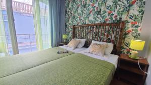 Cama o camas de una habitación en Calypso Kvariati Hotel