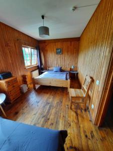 Postel nebo postele na pokoji v ubytování Jaun-Ieviņas