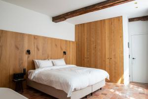 Postel nebo postele na pokoji v ubytování Hotel Riga