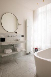 Koupelna v ubytování Hotel Riga