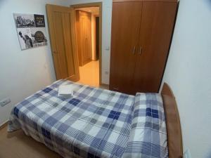 Postel nebo postele na pokoji v ubytování VUT SEGEDA Valle del Manubles