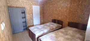 Postel nebo postele na pokoji v ubytování Guesthouse Sagrila