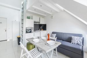 Η κουζίνα ή μικρή κουζίνα στο Le Petit Victor Hugo